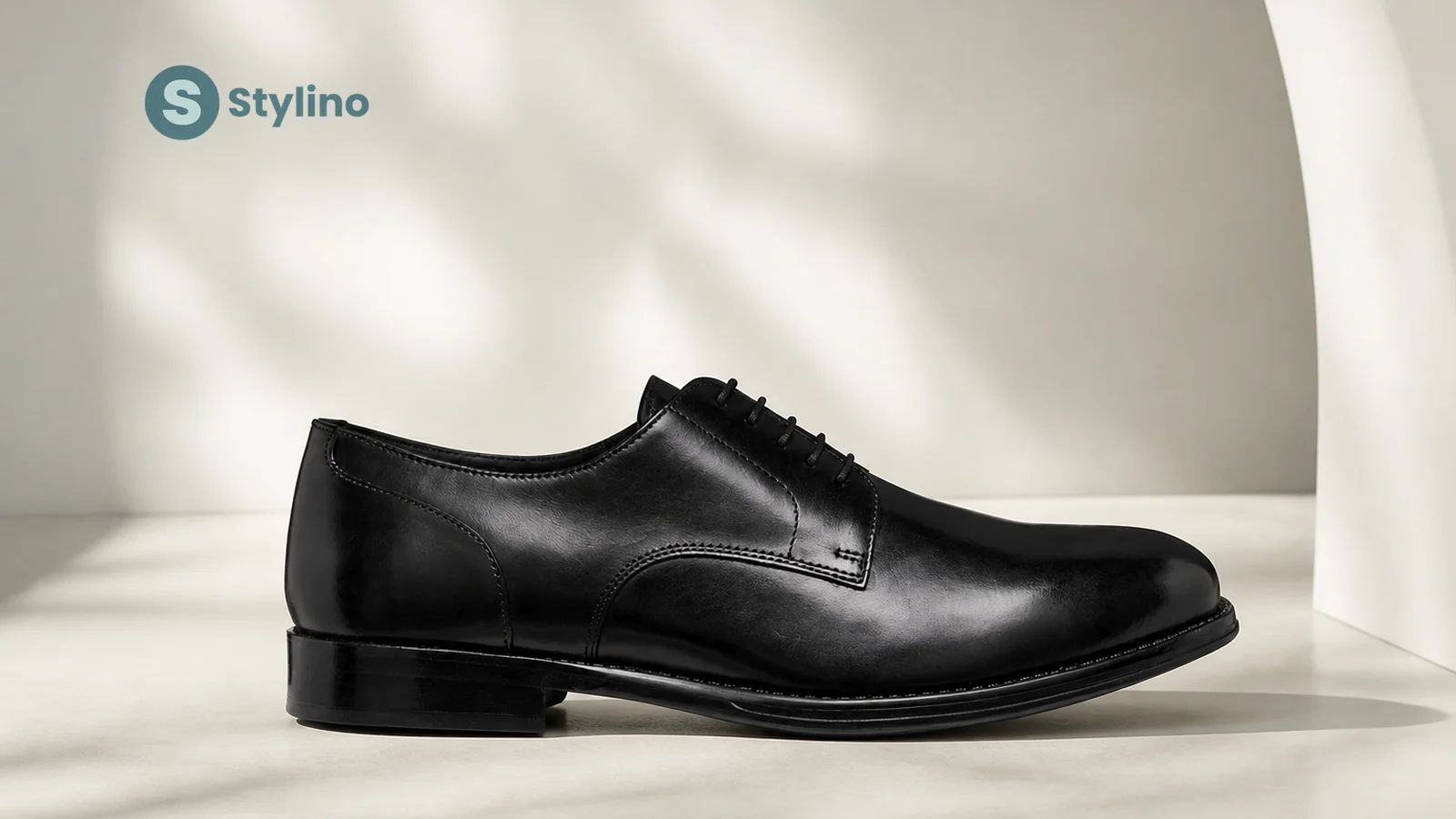 Geox men's black leather dress shoes showcasing breathable sole technology