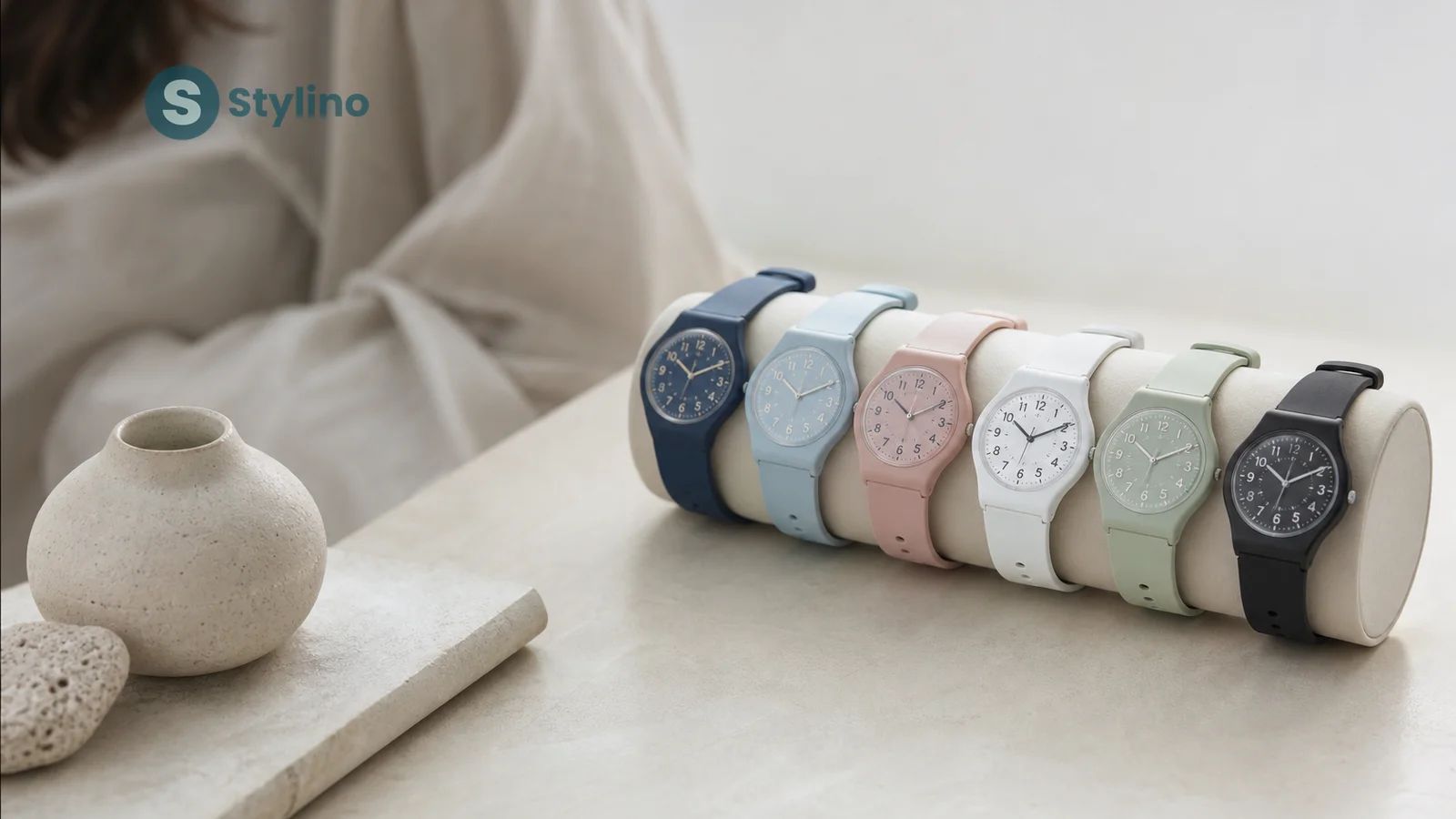 Swatch watches in different sizes from 25mm Lady to 47mm Big Bold displayed on wrist silhouettes